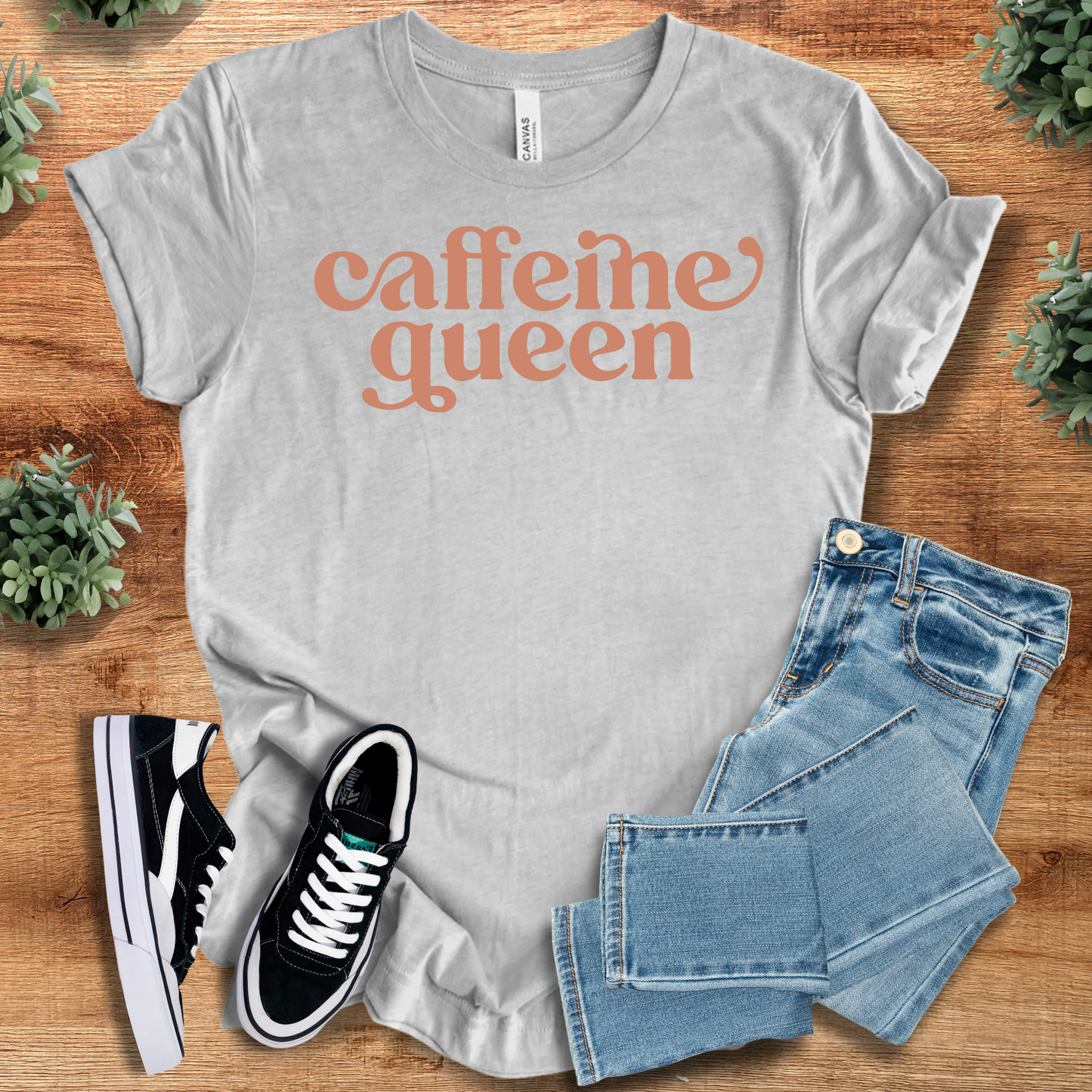 Caffeine Queen - Coffee Lovers T-Shirt in heather gray with tan lettering. Graphic cotton tee styled with denim for laid-back coffee lovers.