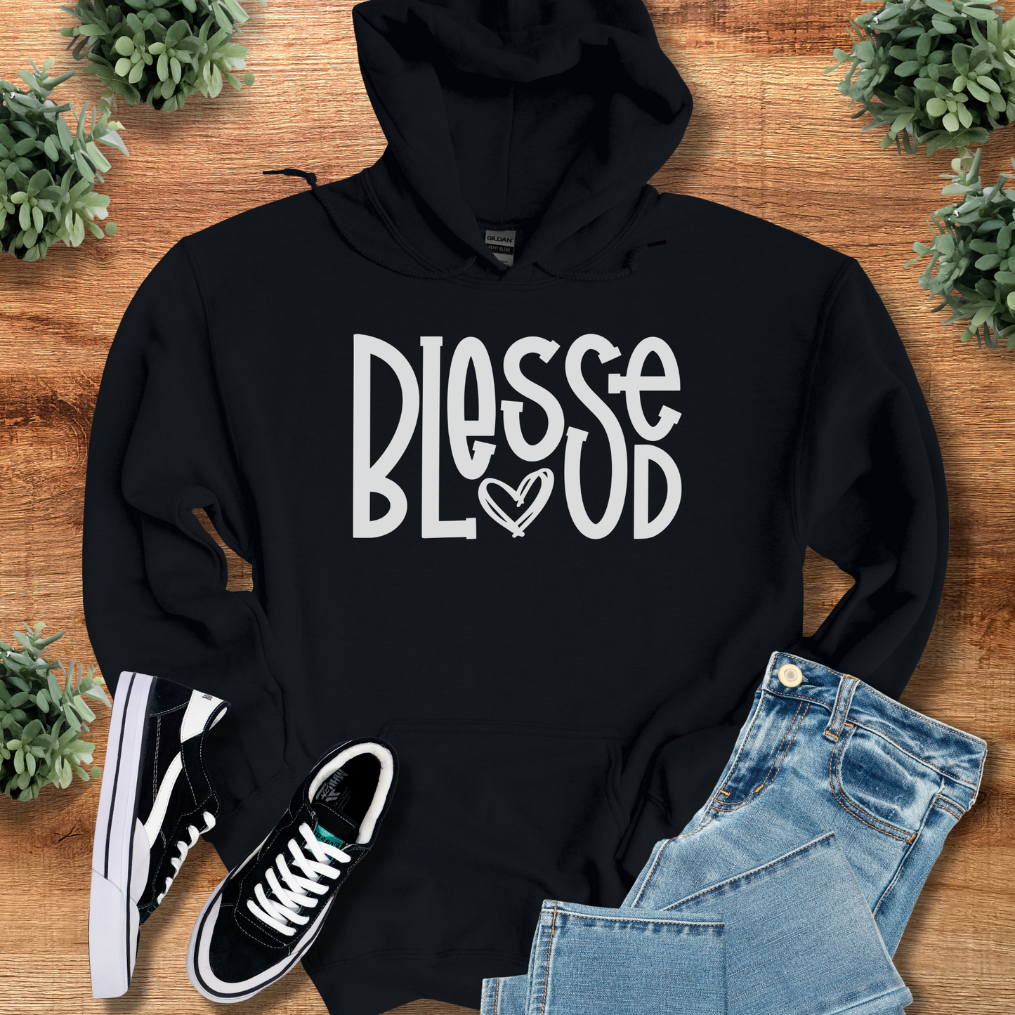 Black Blessed Hoodie with white spiritual lettering and heart detail, stylish religious gift idea for him or her in winter fashion.