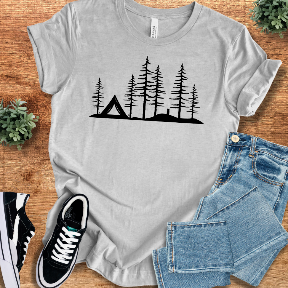 Athletic-heather t-shirt with 'Wild Woods Tent T‑Shirt' text, flat lay styled on a wooden surface.
