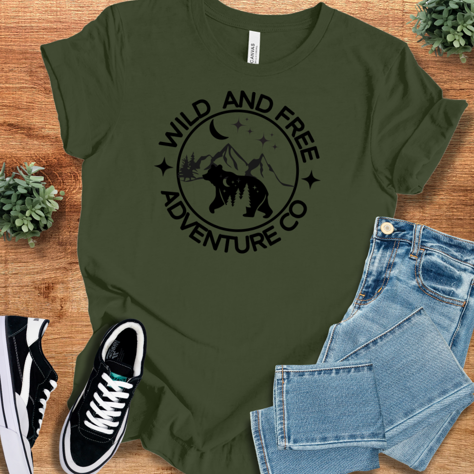 Athletic-heather t-shirt with '' text, flat lay styled on a wooden surface.