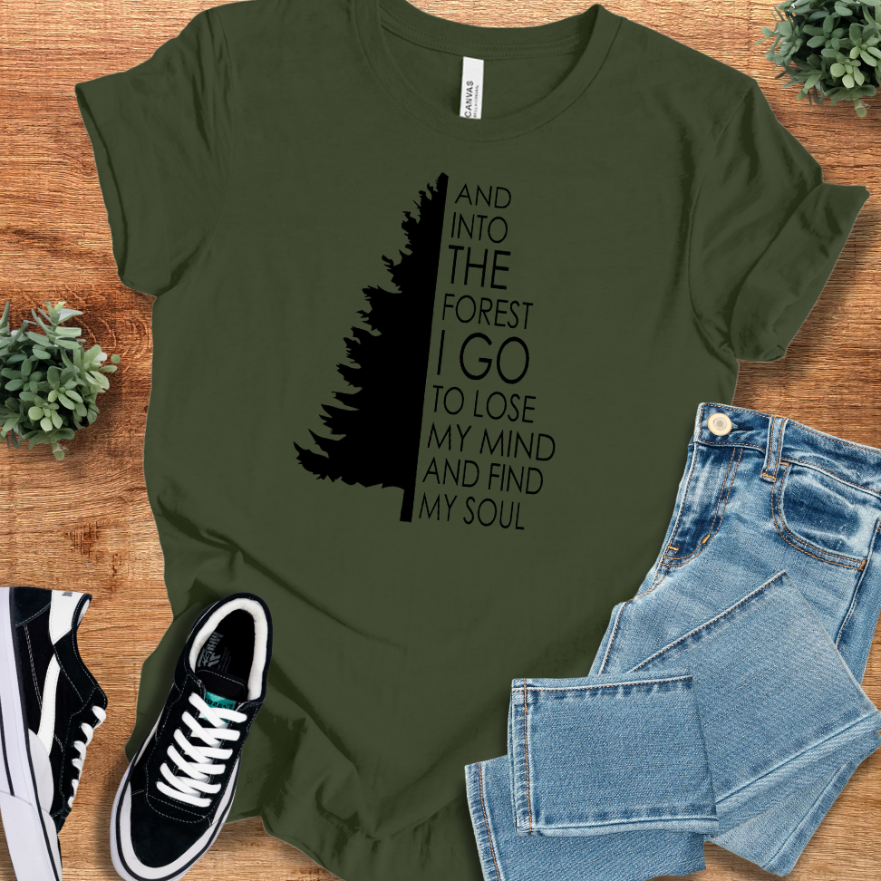 Soft-cream t-shirt with '' text, flat lay styled on a wooden surface.