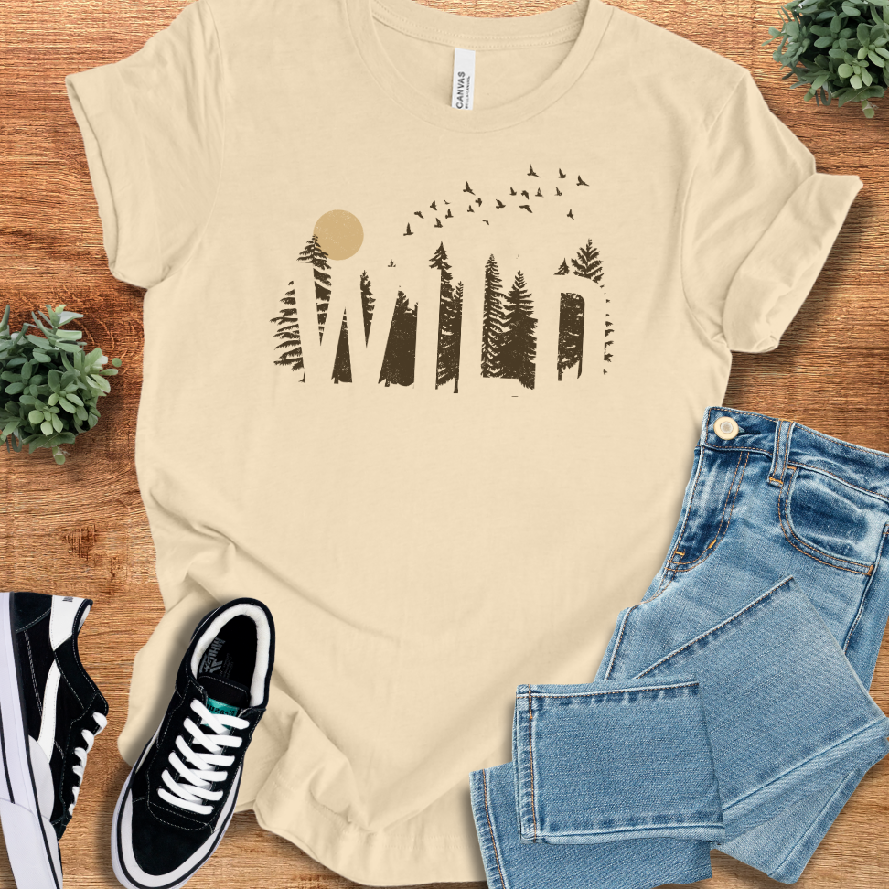 Soft-cream t-shirt with '' text, flat lay styled on a wooden surface.