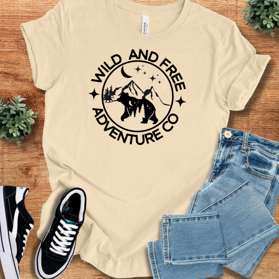 Athletic-heather t-shirt with '' text, flat lay styled on a wooden surface.