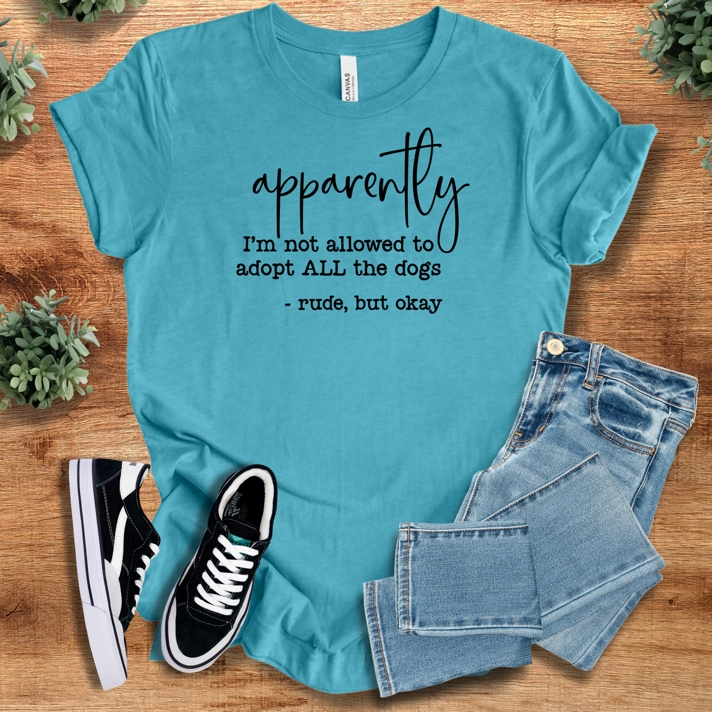 Turquoise funny dog lover t-shirt with sarcastic adoption quote. Lightweight cotton top for quirky pet lovers and animal rescue supporters.