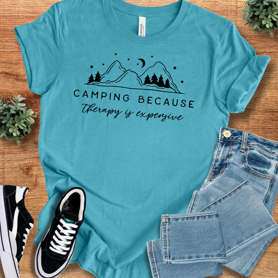 Athletic-heather t-shirt with '' text, flat lay styled on a wooden surface.