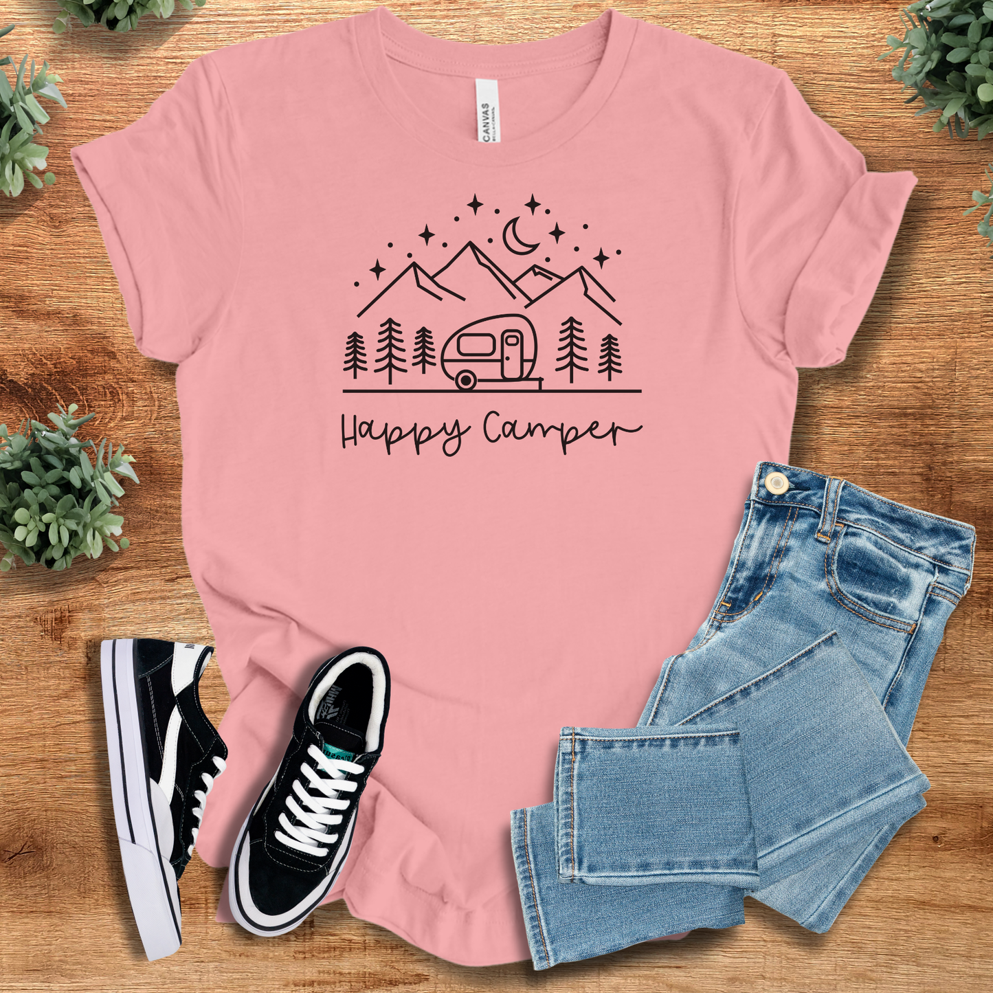 Athletic-heather t-shirt with '' text, flat lay styled on a wooden surface.