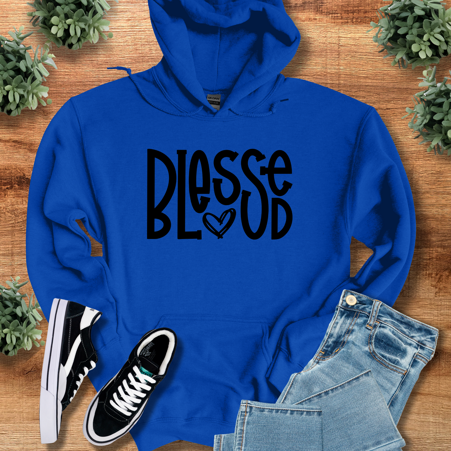 Royal blue Blessed Hoodie with black lettering and heart graphic, cozy Christian sweatshirt for spiritual clothing lovers and gift giving.