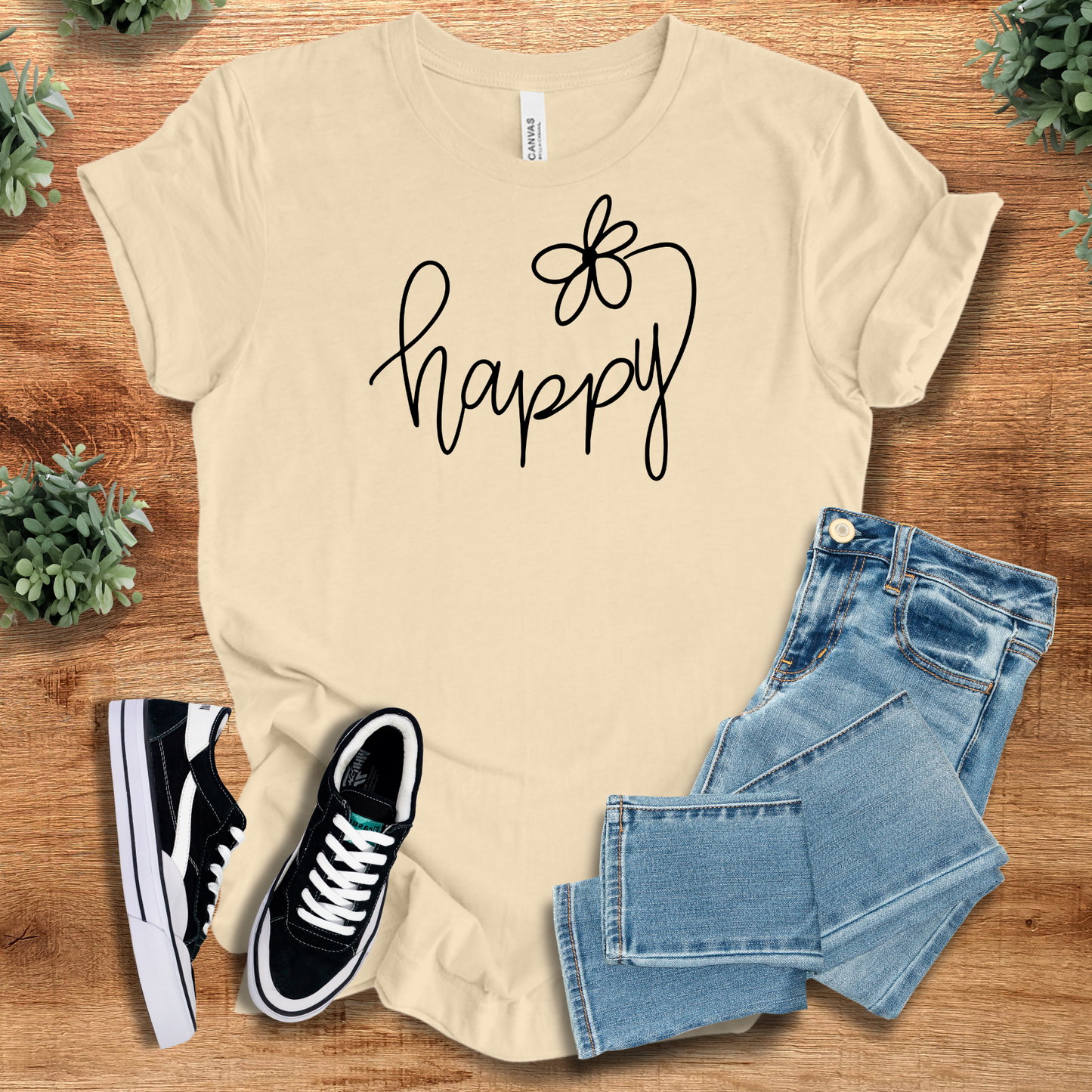 Athletic-heather t-shirt with '' text, flat lay styled on a wooden surface.