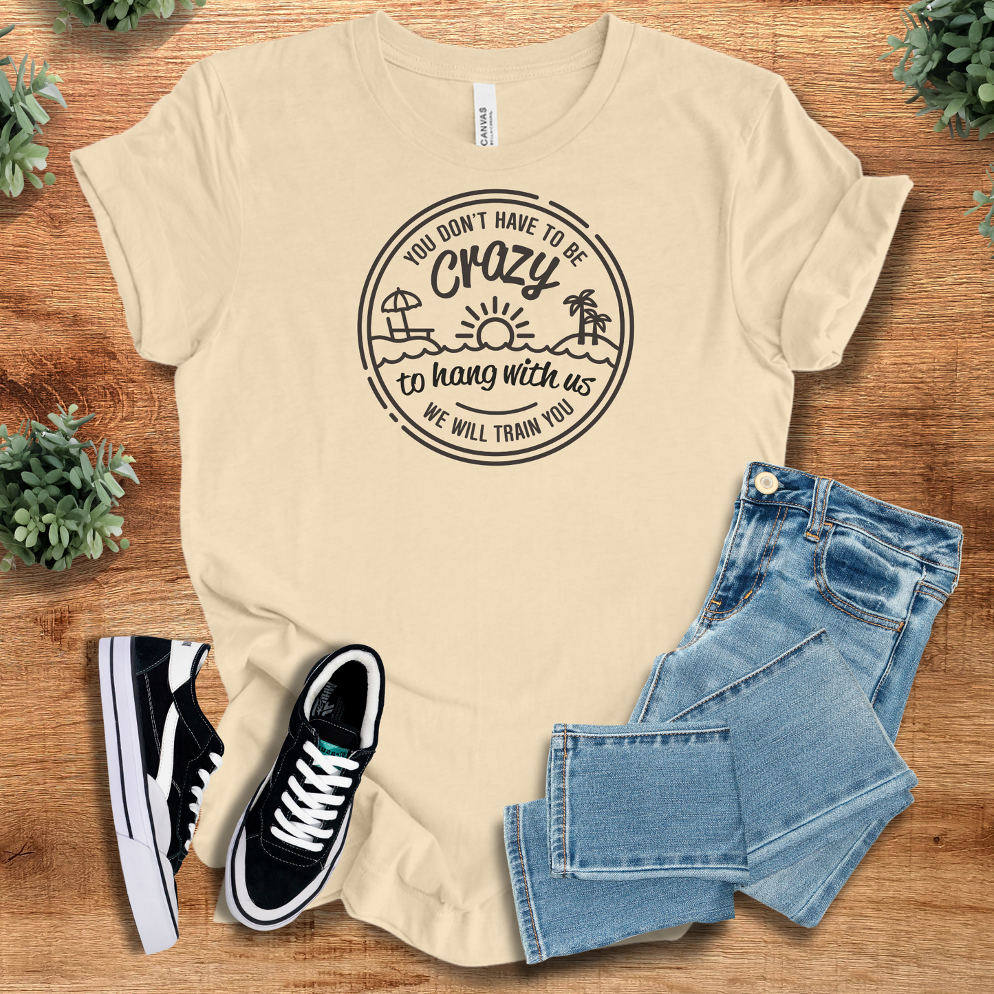 Cream-colored funny t-shirt with minimalist beach-themed quote. Lightweight and breathable for matching group adventures.