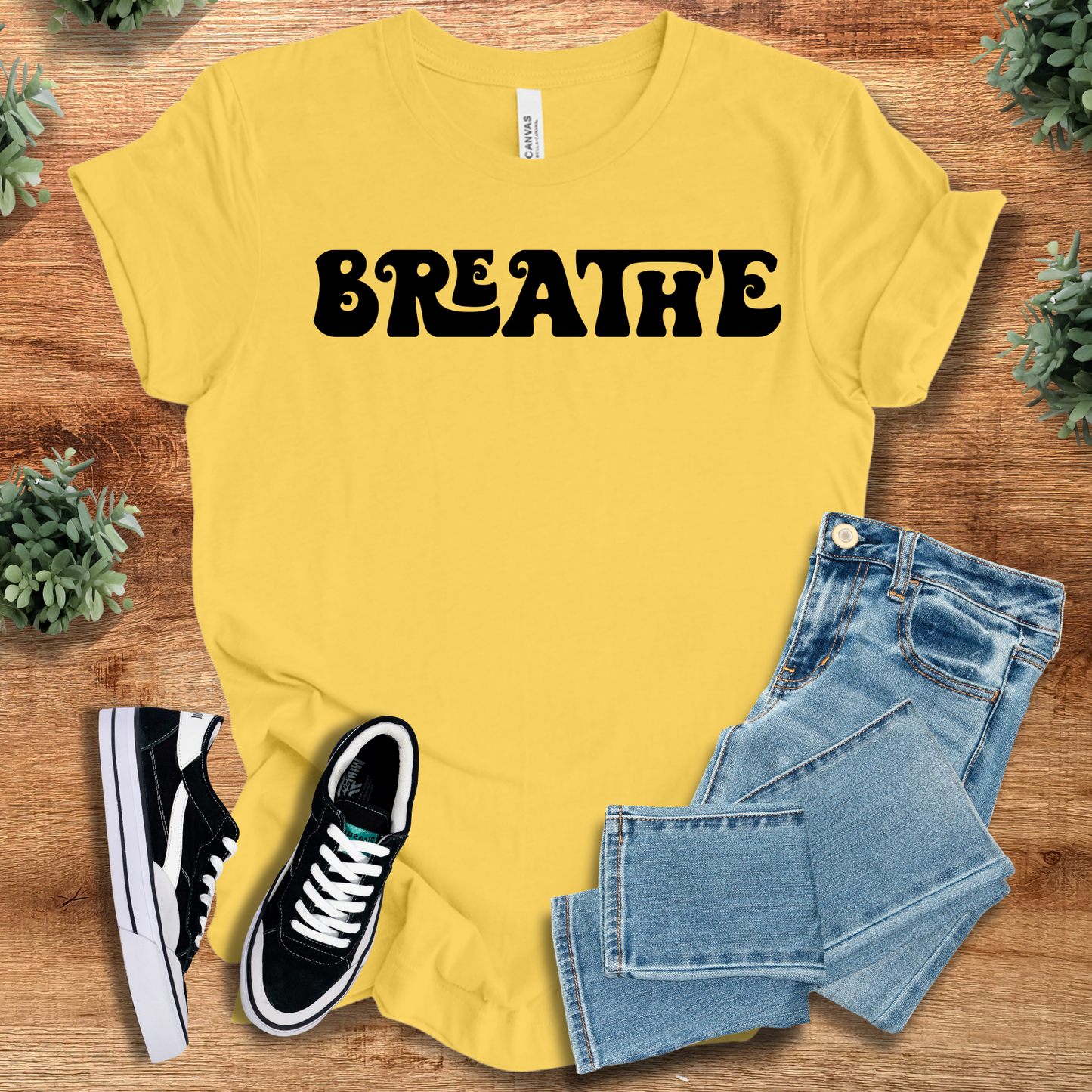 Retro Style T-Shirt - Breathe Tee in bright yellow with bold black text. Eye-catching cotton shirt for yoga lovers and vintage-inspired outfits.