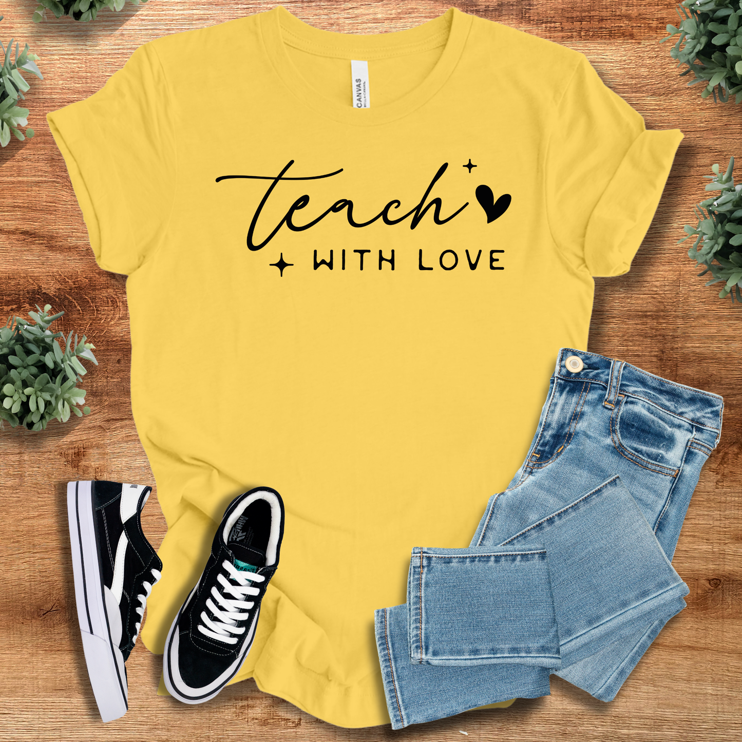 Athletic-heather t-shirt with '' text, flat lay styled on a wooden surface.