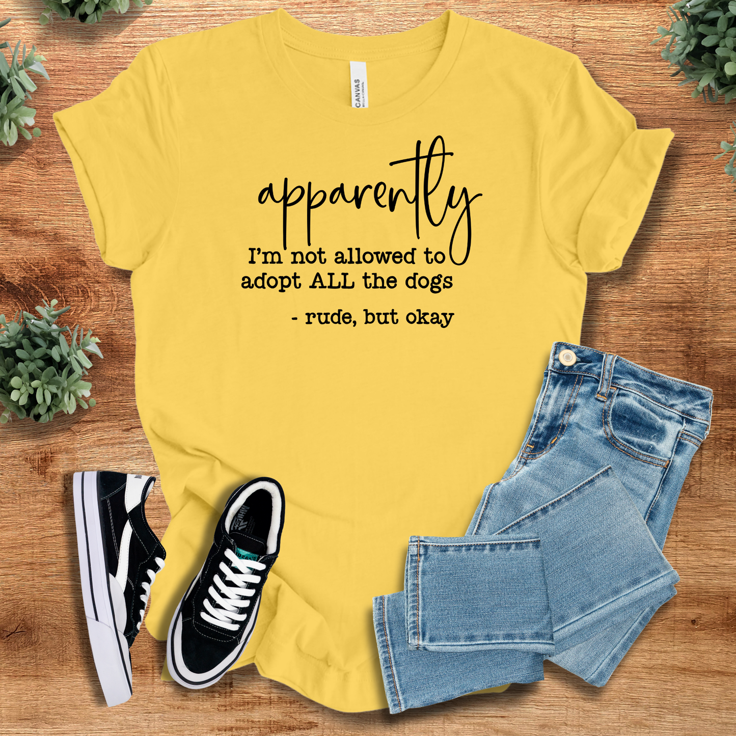 Bright yellow funny dog lover t-shirt with witty adoption message. Lightweight cotton top perfect for dog moms and animal rescue advocates.