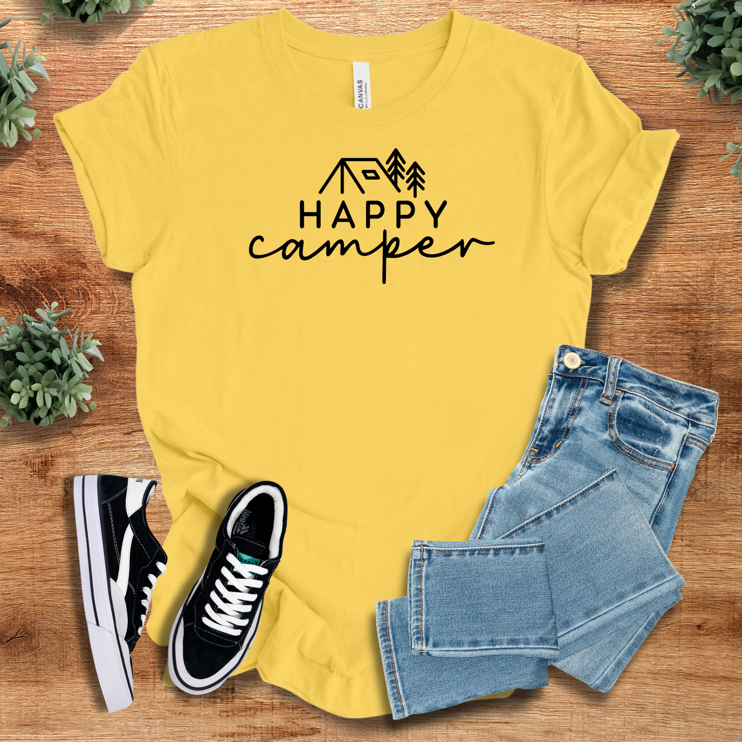 Athletic-heather t-shirt with '' text, flat lay styled on a wooden surface.