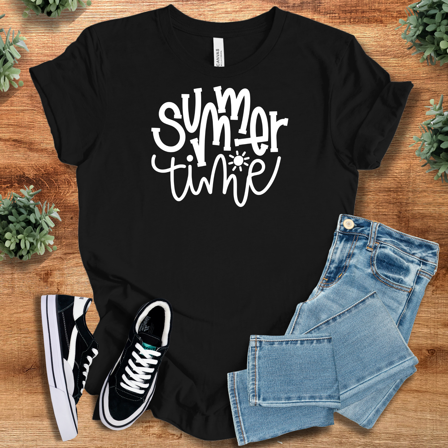 Black Summer Time Tee T‑Shirt in Bella+Canvas fabric, styled with jeans and sneakers. Bold unisex t-shirt with white summer graphic print.