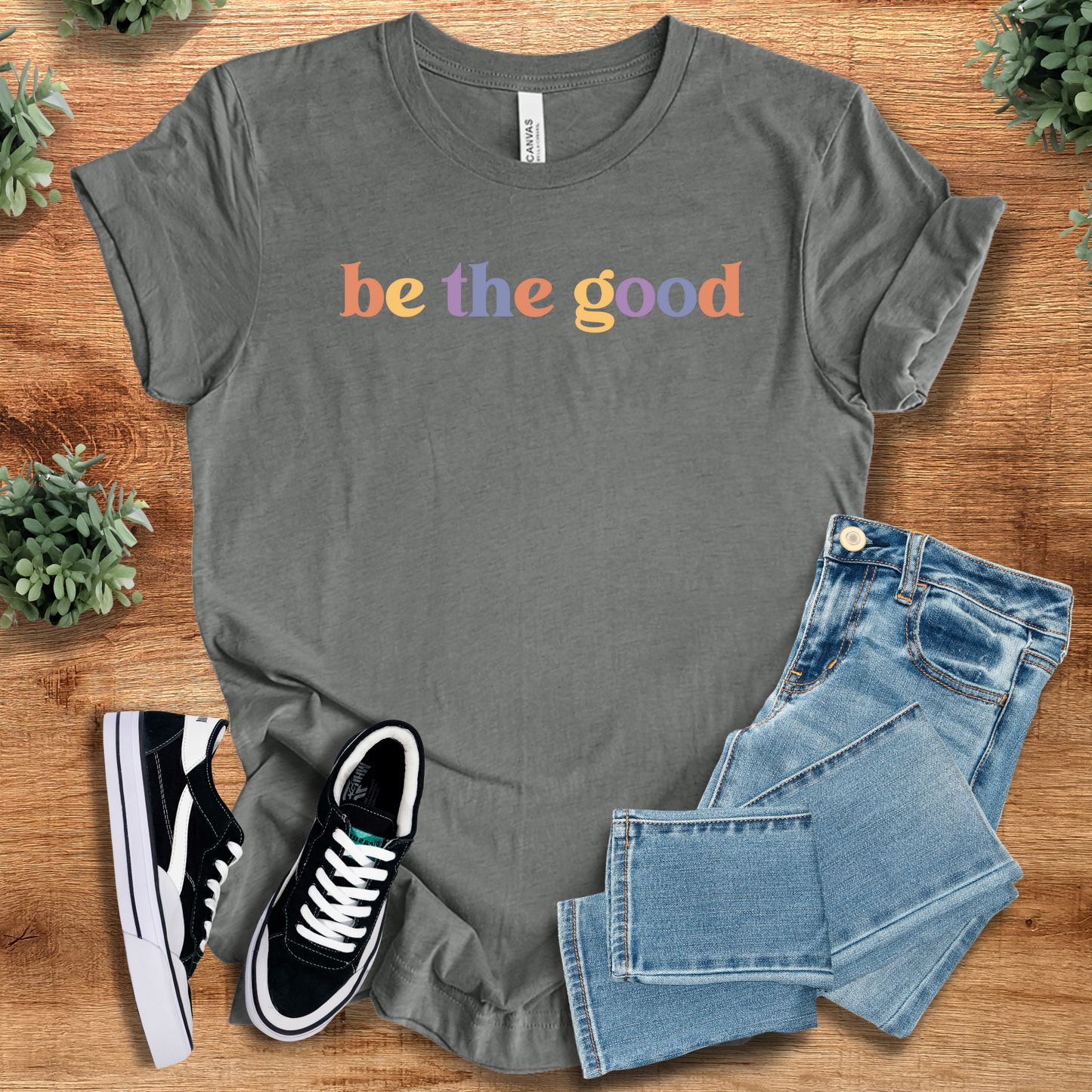 Be the Good Tee in heather gray featuring multicolor slogan. Comfy cotton top for inspirational, minimalist style in casual outfits.