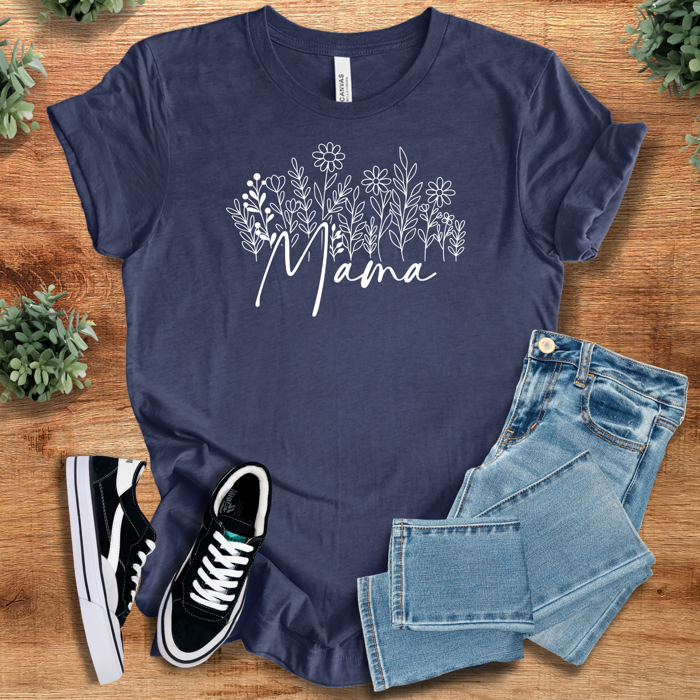 Soft-cream t-shirt with '' text, flat lay styled on a wooden surface.