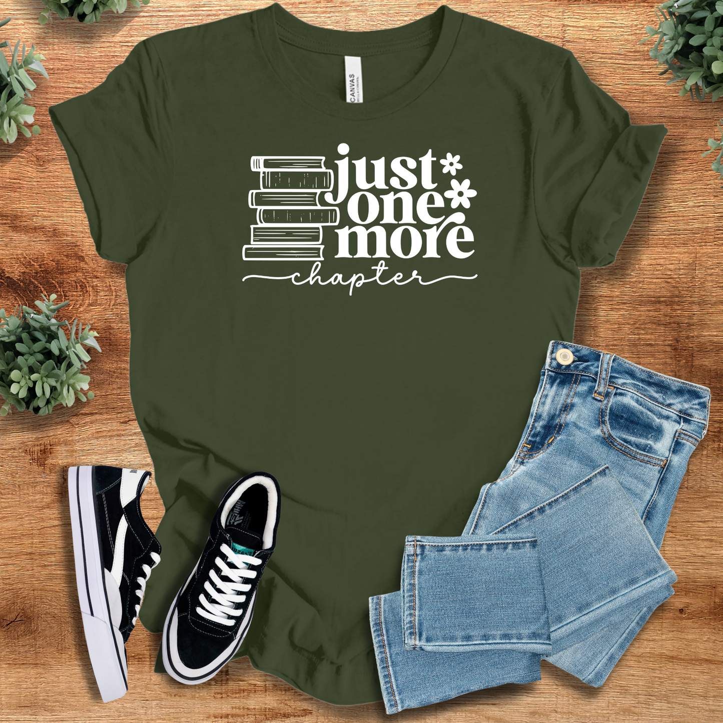 Olive green 'Just One More Chapter' bookish tee with stacked books design. Great unisex shirt for book clubs and literature fans.