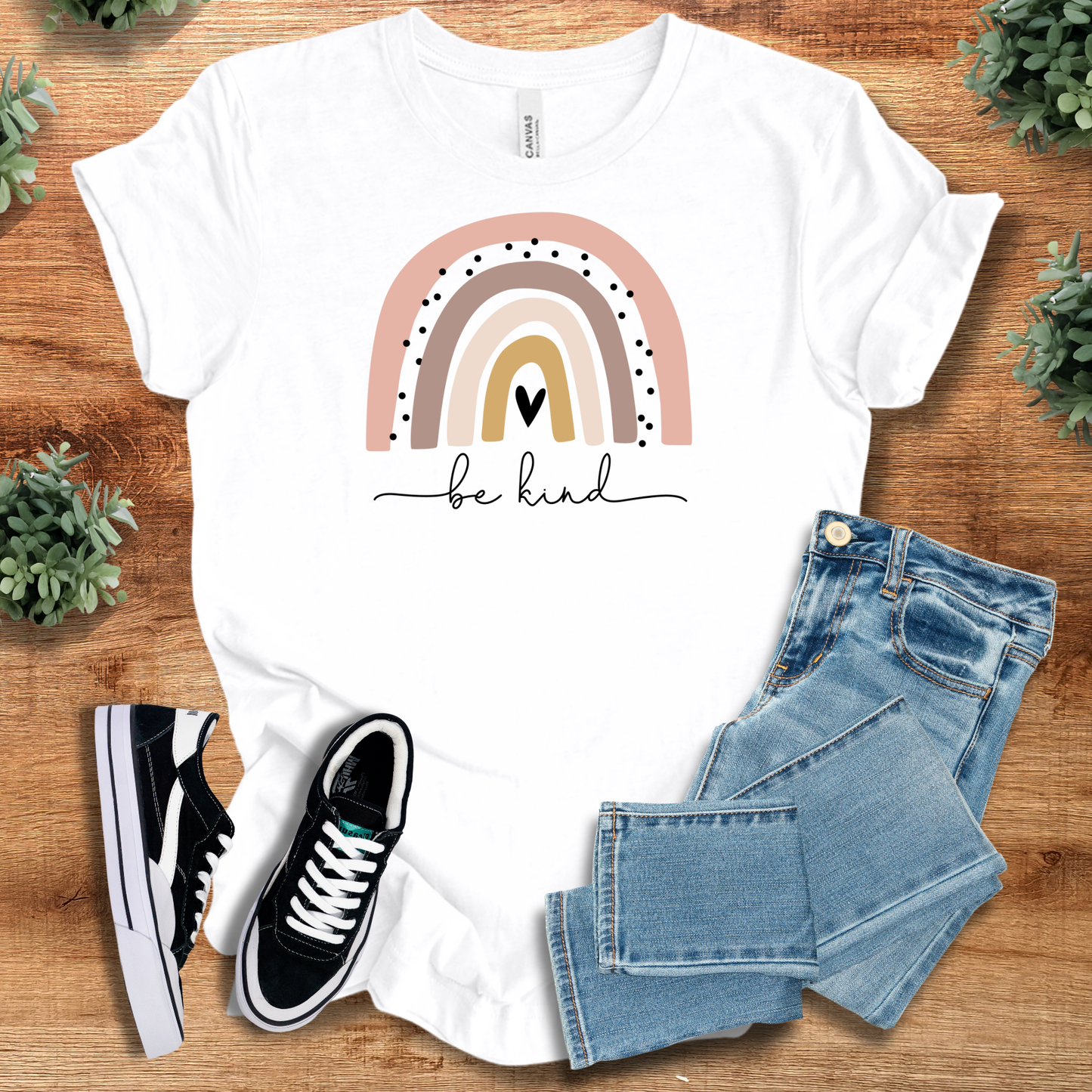 White Rainbow Be Kind Tee with pastel rainbow and heart graphic, 100% cotton casual T-shirt for spreading positivity and kindness.