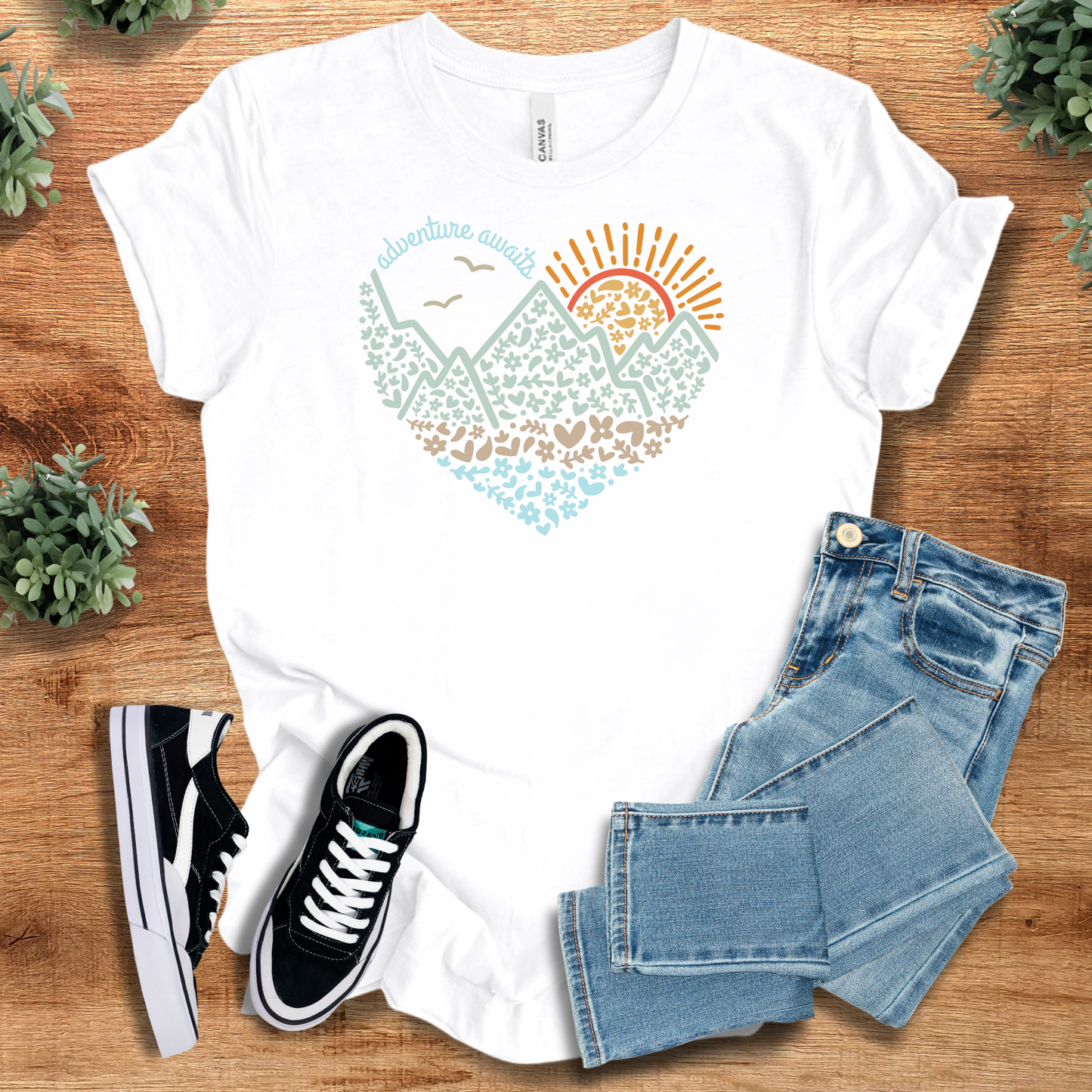 Deep-heather t-shirt with '' text, flat lay styled on a wooden surface.