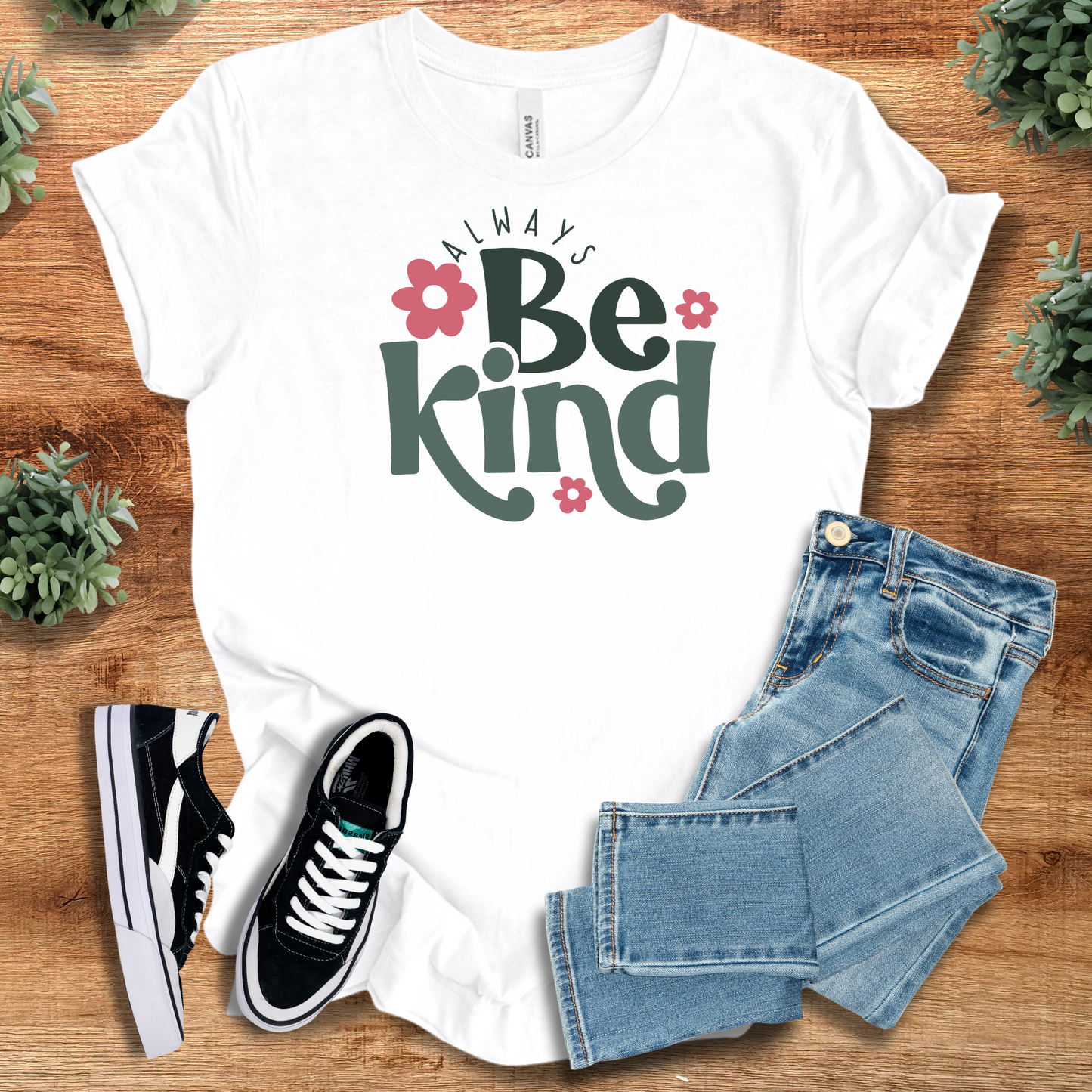 Always Be Kind - Unisex Kindness Tee in white with floral design, styled with jeans and sneakers. Ideal for spreading positivity daily.
