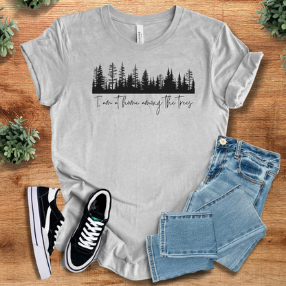 Soft-cream t-shirt with '' text, flat lay styled on a wooden surface.