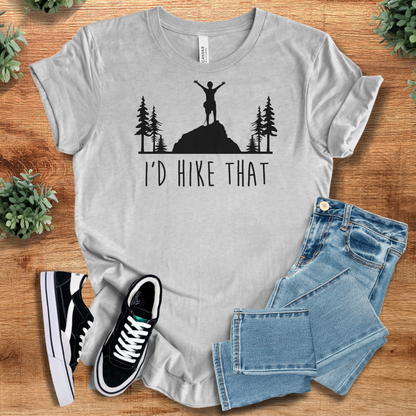Heather-mauve t-shirt with '' text, flat lay styled on a wooden surface.