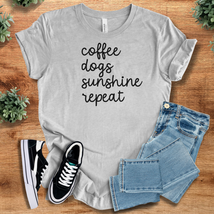 Heather-aqua t-shirt with '' text, flat lay styled on a wooden surface.