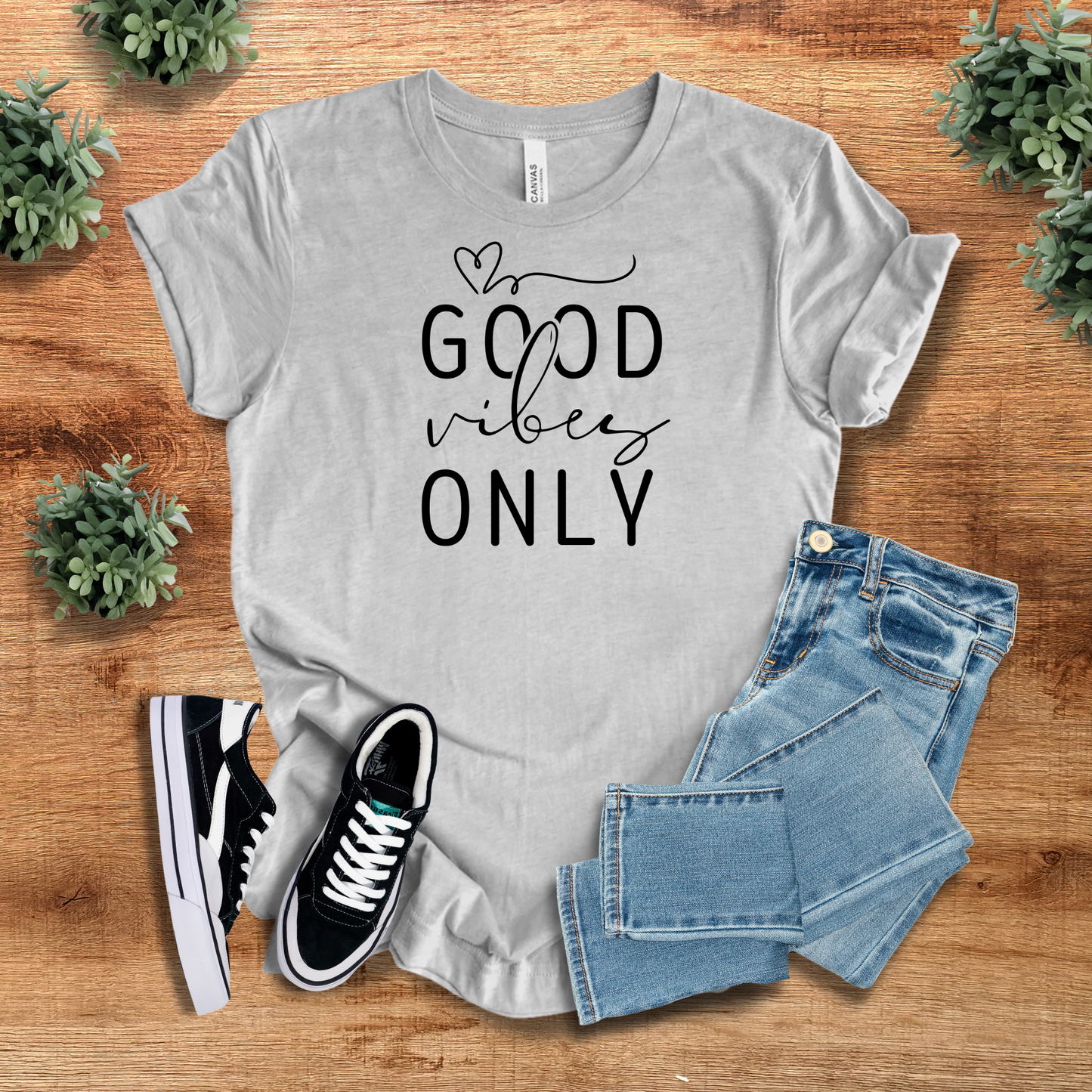 Good Vibes Only T-Shirt in light gray with minimalist typography. Soft and breathable fabric, great for casual and feel-good fashion.