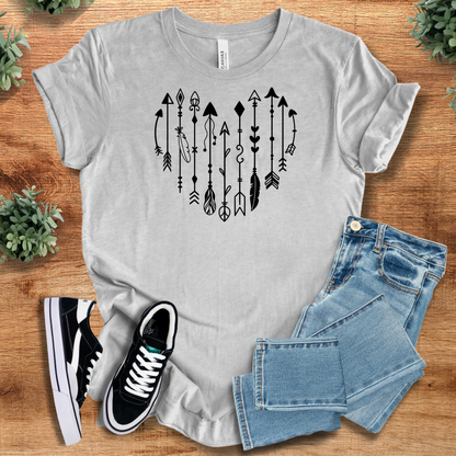 Heather-mauve t-shirt with '' text, flat lay styled on a wooden surface.