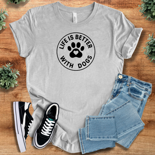 Light gray Life is Better with Dogs T-shirt featuring black paw print graphic. 100% cotton dog lover tee for casual everyday wear.