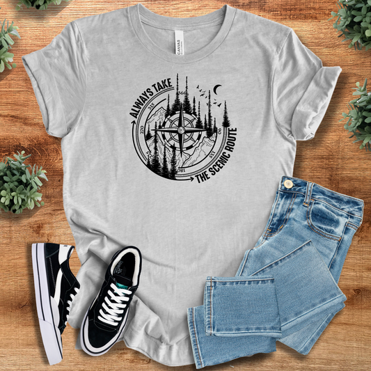 Gray Scenic Route T-Shirt with compass and forest graphic, 100% cotton retail fit for travel and hiking lovers.
