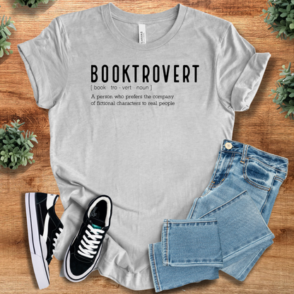 Heather-aqua t-shirt with '' text, flat lay styled on a wooden surface.