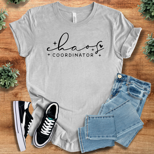 Chaos Coordinator Tee in light gray, 100% cotton unisex T-shirt styled with jeans and sneakers. Ideal for multitaskers and casual wear.