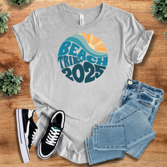 Light gray Beach Trip 2025 Tee - Casual Summer Shirt | 100% Cotton with retro sun and wave graphic, styled with jeans and sneakers.