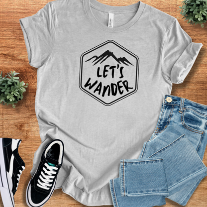 Heather-aqua t-shirt with '' text, flat lay styled on a wooden surface.