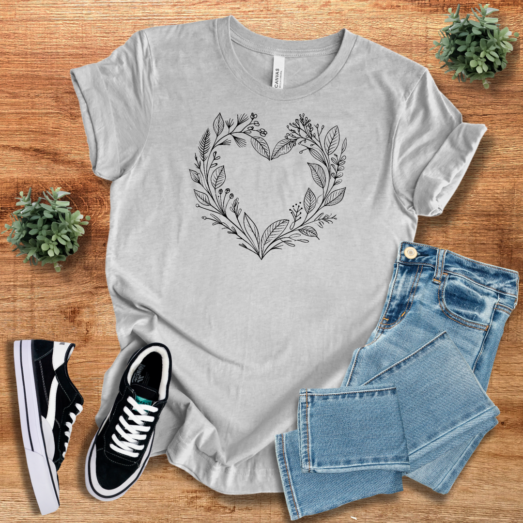 Heather gray unisex cotton t-shirt with a floral heart graphic. A comfortable and sustainable fashion choice for men and women.