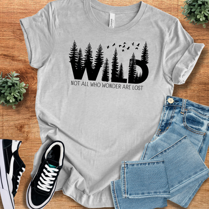 Soft-cream t-shirt with '' text, flat lay styled on a wooden surface.