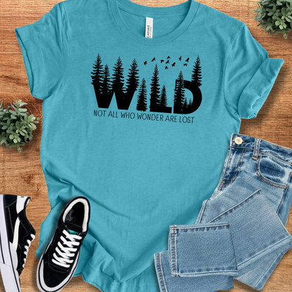 Soft-cream t-shirt with '' text, flat lay styled on a wooden surface.