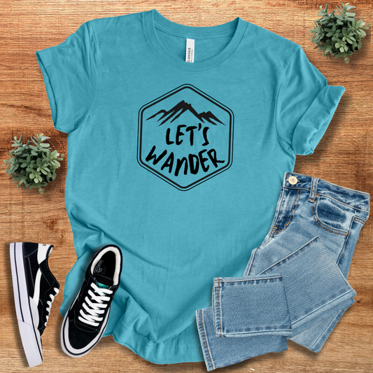 Turquoise Wanderlust Graphic Tshirt featuring 'Let's Wander' mountain design. A lightweight, breathable unisex tee for explorers and nature lovers.