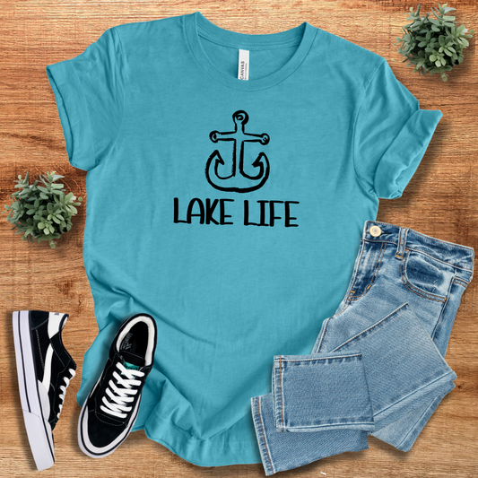 Turquoise Lake Life Graphic Tee featuring a black anchor design, perfect for summer adventures and casual outdoor wear.