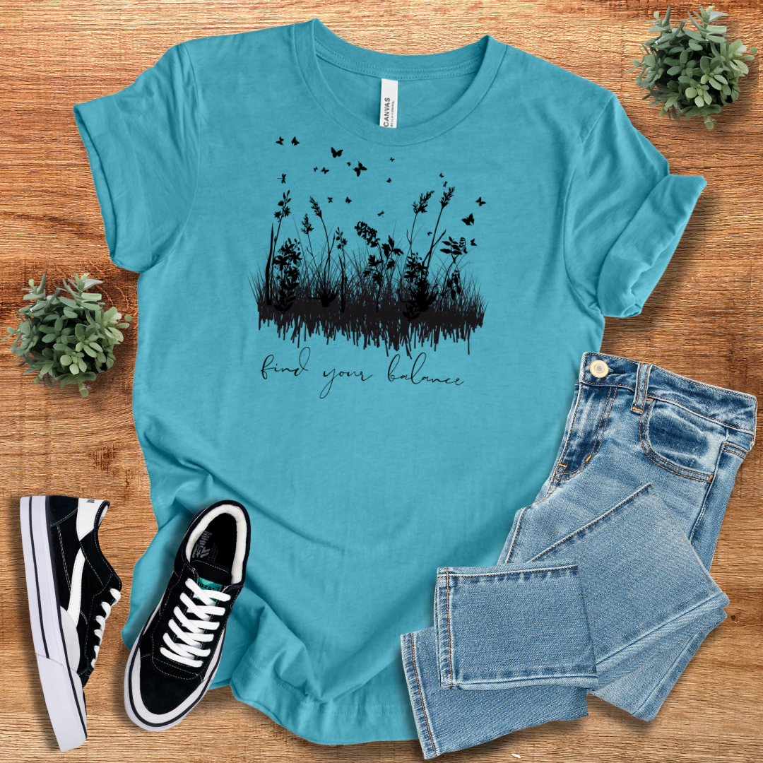 Turquoise Find Your Balance T-shirt with black botanical design. A comfortable and versatile cotton tee for casual and active outfits.