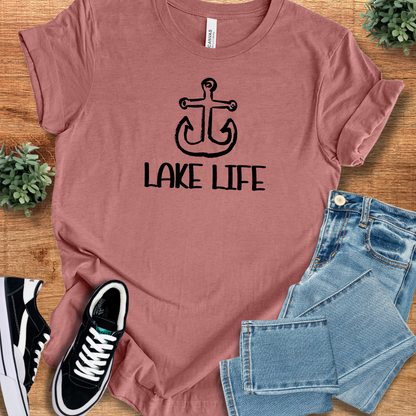 Heather-aqua t-shirt with '' text, flat lay styled on a wooden surface.