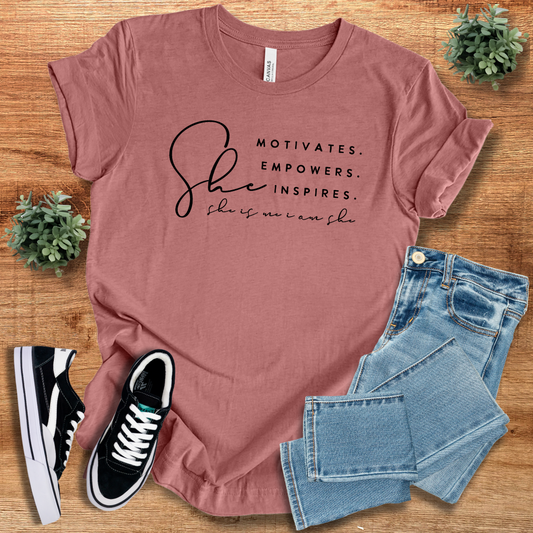 Dusty rose unisex t-shirt with 'She Motivates Empowers Inspires' inspirational quote. Soft cotton, crew neck, and regular fit for versatile casual wear.