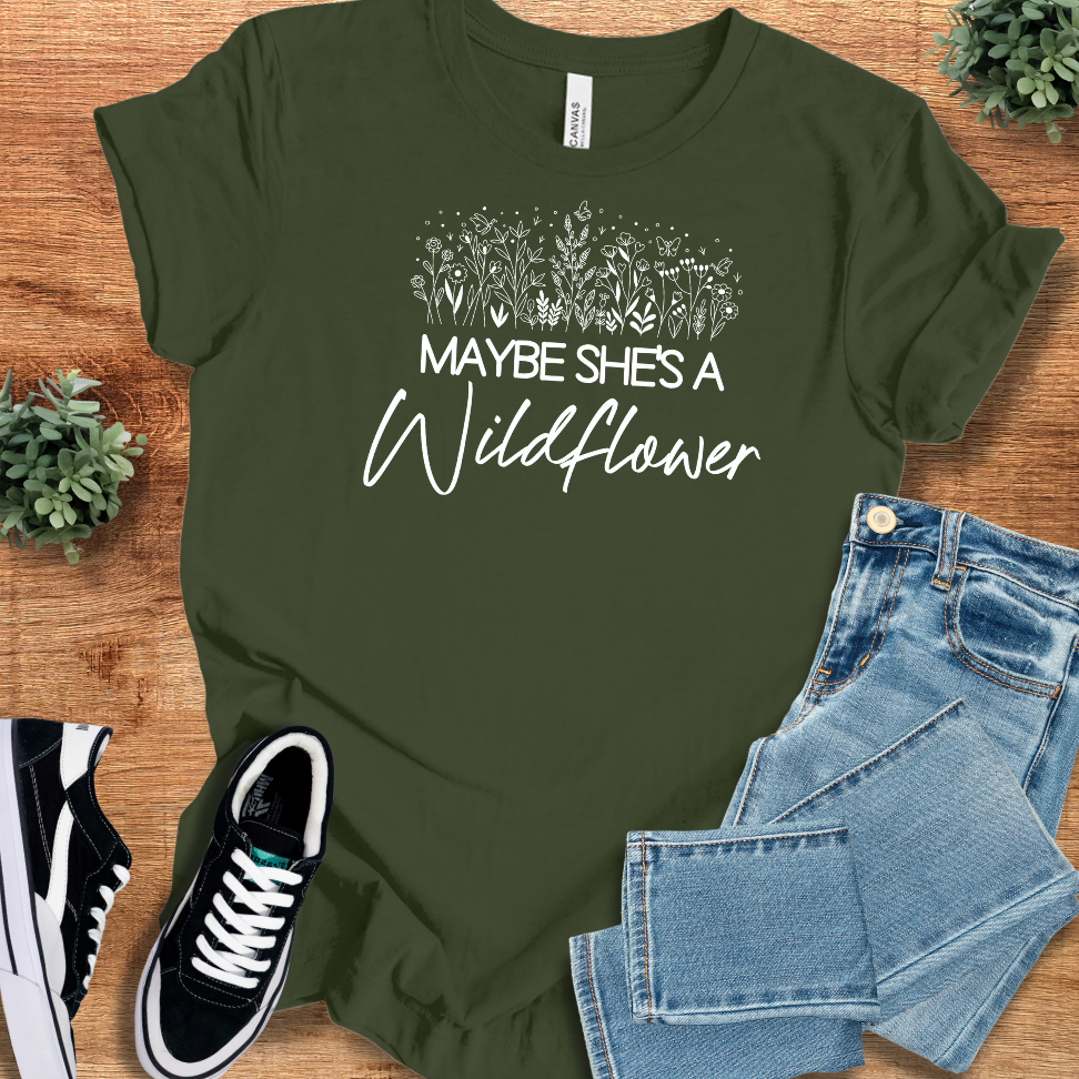 Heather-aqua t-shirt with '' text, flat lay styled on a wooden surface.