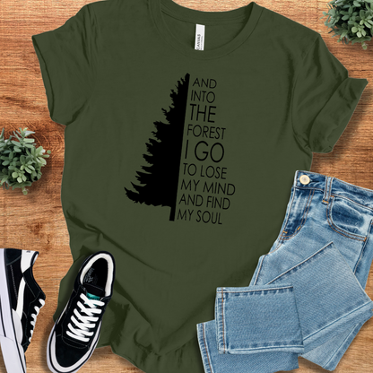 Soft-cream t-shirt with '' text, flat lay styled on a wooden surface.