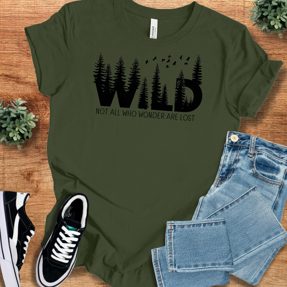 Soft-cream t-shirt with '' text, flat lay styled on a wooden surface.