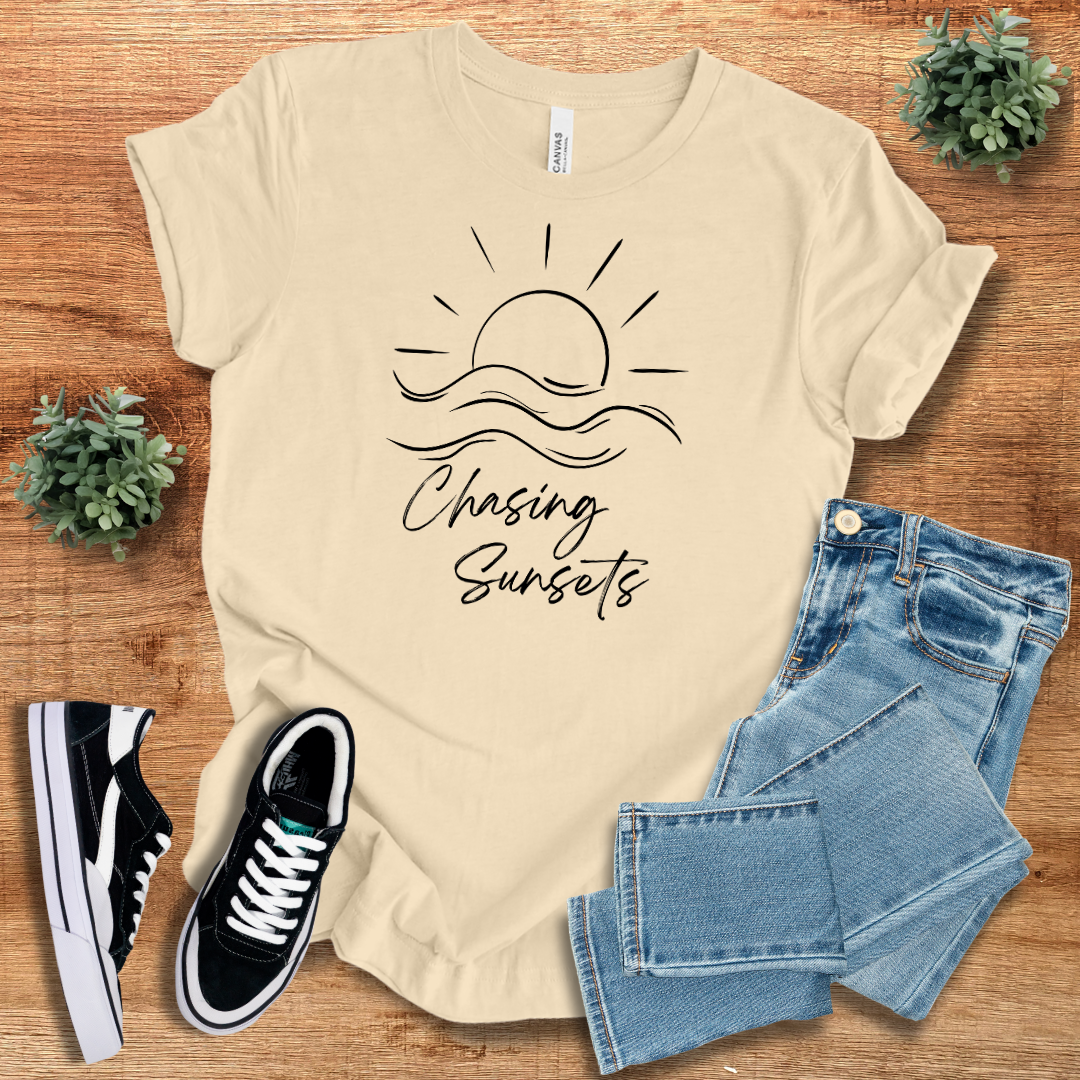 Beige Chasing Sunsets T-shirt with a minimalist black sun and waves design, perfect for layering. Made from lightweight, breathable cotton fabric.