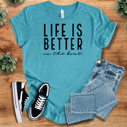 Heather-navy t-shirt with '' text, flat lay styled on a wooden surface.