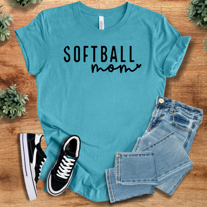 Heather-aqua t-shirt with 'Softball Mom Tee T‑Shirt' text, flat lay styled on a wooden surface.