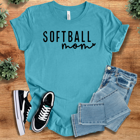 Softball Mom Tee in teal with bold black lettering, styled with jeans and sneakers. Comfortable and durable softball mom t-shirt for game day.